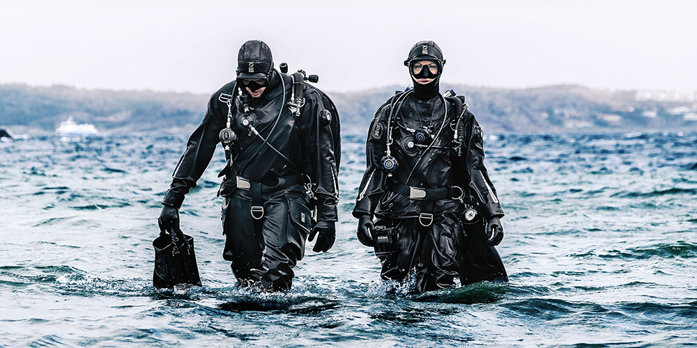 Divers in drysuit